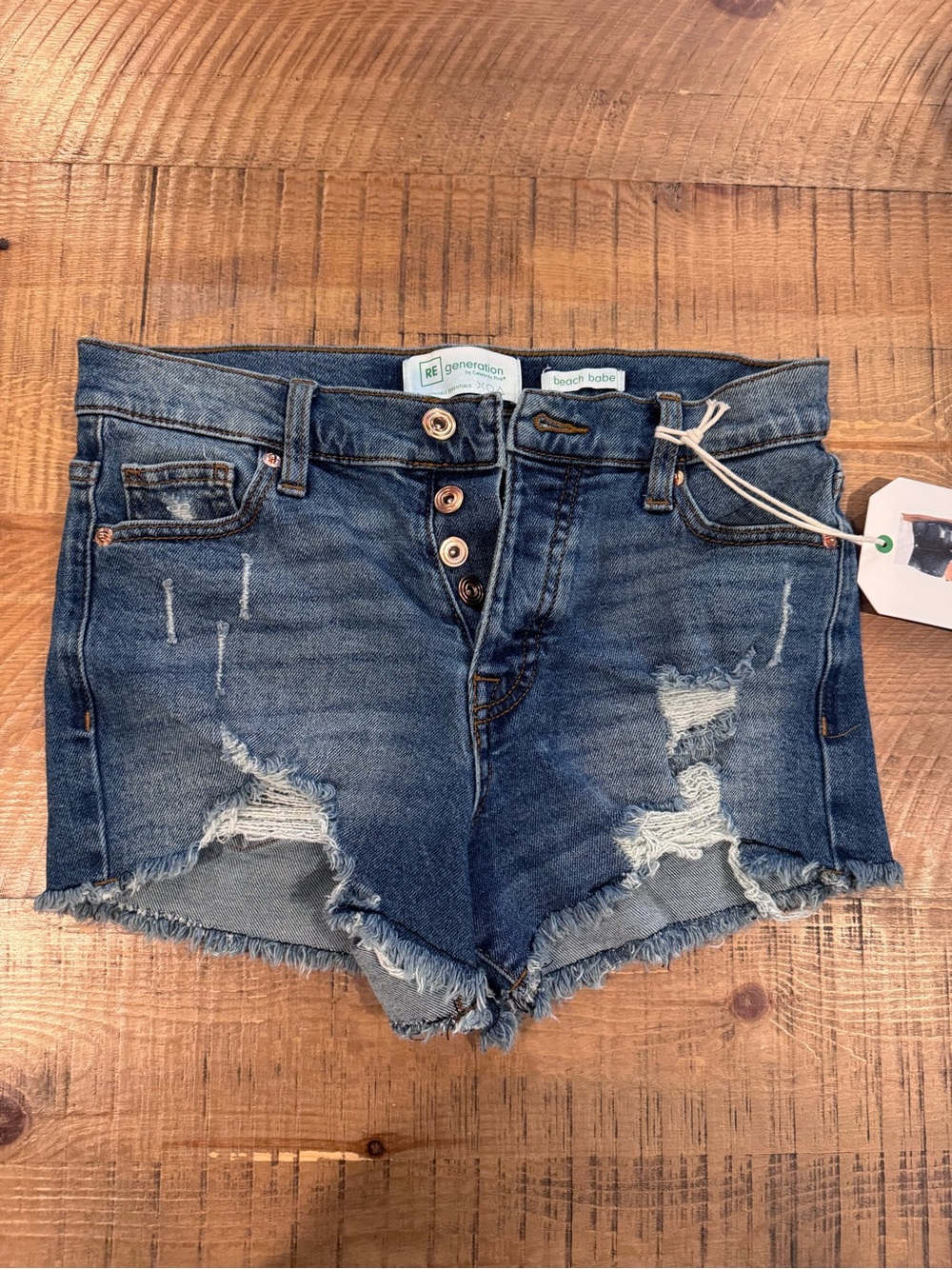 Re/done Style High-Rise Distressed Jean Shorts in Medium Blue